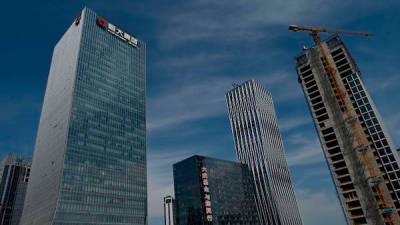 Долг в 300 миллиардов долларов: Evergrande отсрочила дефолт - bin.ua - Китай - Украина - Reuters
