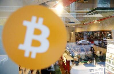 BTC за Tesla и оценка CoinList: новости крипторынка - smartmoney.one - США - Reuters