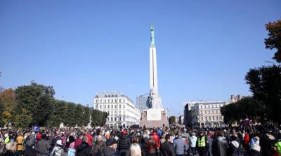 В Латвии прошла акция протеста против принудительной вакцинации - belta.by - Белоруссия - Рига - Минск - Латвия