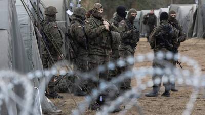 Группа мигрантов штурмом прорвалась на территорию Польши - iz.ru - Израиль - Белоруссия - Ирак - Польша
