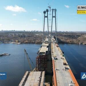 На запорожском мосту смонтировали 13 стальных канатов. Фото - reporter-ua.com - Запорожье - Строительство