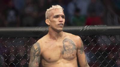 Дастин Порье - Чарльз Оливейра - Оливейра победил Порье на турнире UFC 269 - iz.ru - Израиль - Бразилия