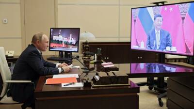 Владимир Путин - Си Цзиньпин - Юрий Ушаков - Путин и Си Цзиньпин договорились увеличивать доли нацвалют в двусторонней торговле - russian.rt.com - Россия - Китай