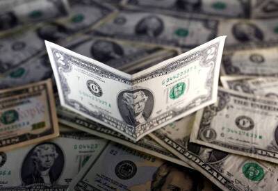 Средний курс доллара США со сроком расчетов "завтра" по итогам торгов составил 73,8689 руб. - smartmoney.one - США - Reuters