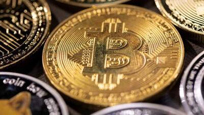 Илон Маск рассекретил имя истинного создателя биткоина - iz.ru - Израиль