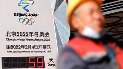 Доминик Рааб - В Великобритании пообещали рассмотреть вопрос о бойкоте Олимпиады в Китае - iz.ru - Китай - США - Англия - Израиль - Новая Зеландия - Reuters
