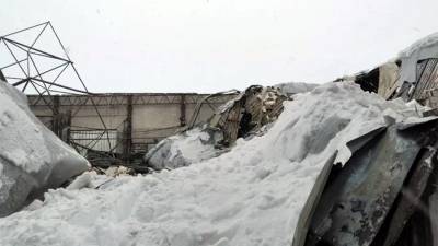 Под завалами ангара в Калужской области обнаружили тело мужчины - iz.ru - Калужская обл. - Магадан