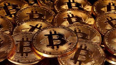 Сезон рекордов: курс биткоина впервые превысил $50 000 - russian.rt.com