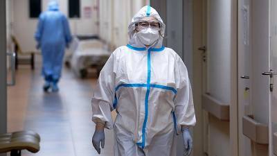 В России за сутки выявили 12 828 новых случаев заболевания COVID-19 - iz.ru - Москва - Санкт-Петербург - Московская обл.