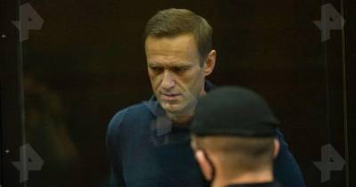 Алексей Навальный - Суд постановил заменить Навальному условный срок на реальный - ren.tv - Москва