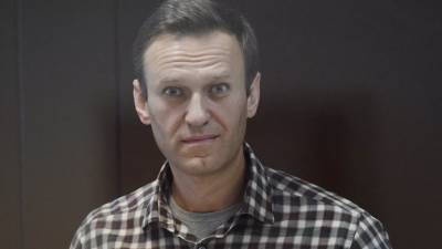 Алексей А.Навальный - Мосгорсуд признал законным решение о замене Навальному условного срока реальным - russian.rt.com