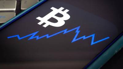 Курс биткоина обновил исторический максимум и превысил $57 тыс. - iz.ru