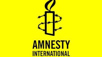 Навальный - Навальный лишен статуса "узника совести" – Amnesty International - polit.info - Англия