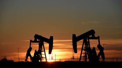 Виталий Калугин - Цена нефти Brent поднялась выше $59 за баррель - russian.rt.com