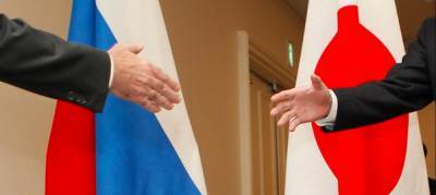 Есихидэ Суг - Мотэги Тосимицу - Япония дистанцировалась от антироссийских санкций Запада - politnavigator.net - Москва - Россия - Токио - Япония