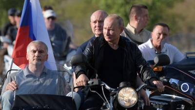Владимир Путин - Андрей Кондрашов - Путин: Крым присоединили, чтобы не было, как в Донбассе - svoboda.org - Крым