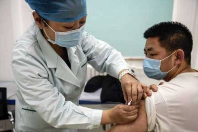 Гао Фу - Китай хочет вакцинировать 70-80% населения от COVID-19 до середины 2022-го - novostiua.news - Украина