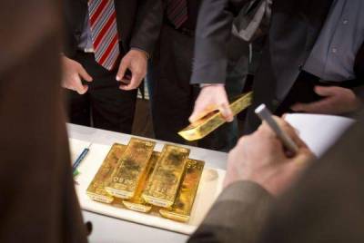 Фьючерсы на золото подорожали в ходе американских торгов - smartmoney.one - Reuters
