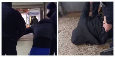 Повалили на землю лицом в пол: в Харькове полиция вывела из метро мужчину без маски, кадры - kharkov.politeka.net - Харьковская обл. - Харьков