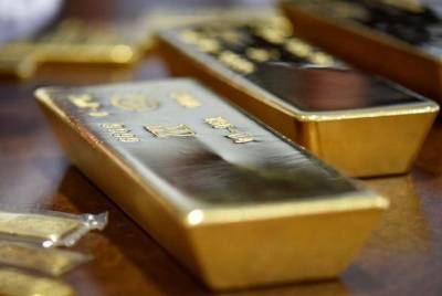Фьючерсы на золото подешевели в ходе американских торгов - smartmoney.one - Reuters