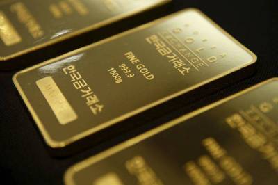 Фьючерсы на золото подорожали в ходе американских торгов - smartmoney.one - Reuters