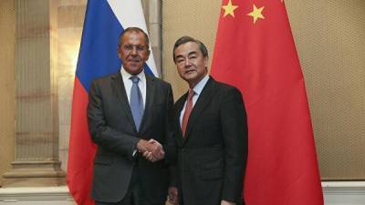 Сергей Лавров - И.Ван - Россия призвала Китай дать бой санкциям и доллару - obzor.lt - Москва - Россия - Китай - Южная Корея - Пекин