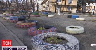 Конец декора советской эпохи: в Киеве вывозят резиновые шины из дворов многоэтажек - tsn.ua - Киев