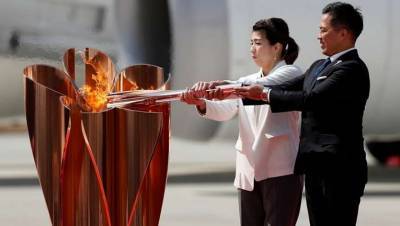 Есихидэ Суг - Эстафета олимпийского огня стартует сегодня в Японии - lenta.ua - Киев - Япония