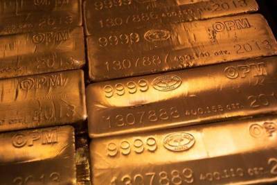 Фьючерсы на золото подешевели во время азиатских торгов - smartmoney.one - Reuters