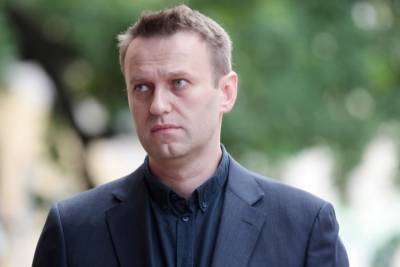 Алексей Навальный - Бюро переводов подало иск к Навальному из-за репутации Путина - mk.ru