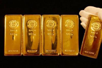Фьючерсы на золото подешевели в ходе американских торгов - smartmoney.one - Reuters