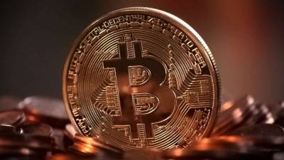 Покупать или продавать. Эксперты дали прогноз на курс биткоина - ivbg.ru - Россия