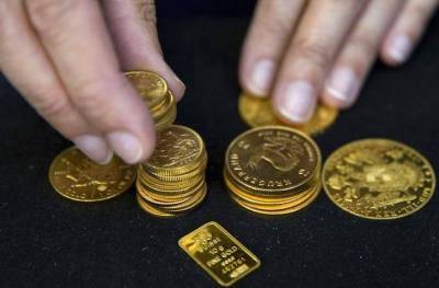 Фьючерсы на золото подорожали в ходе американских торгов - smartmoney.one - Reuters