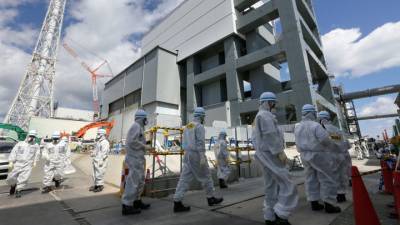 Есихидэ Сугой - Япония сольет радиоактивную воду с "Фукусимы" в Мировой океан - vesti.ru - Япония