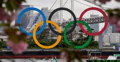 Есихидэ Суг - Джо Байден - Премьер Японии заверил в намерении провести Олимпиаду, несмотря на новую вспышку COVID-19 - reendex.ru - Токио - Япония