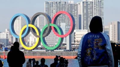 Есихидэ Суг - Джо Байден - В Японии не намерены отказываться от проведения ОИ-2020 из-за коронавируса - russian.rt.com - Токио - Япония