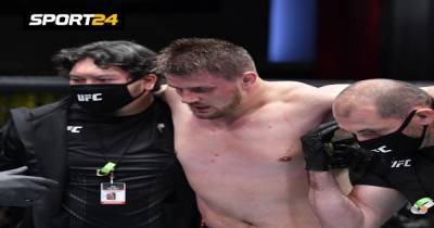 Олег Тактаров - Александр Романов - Русский тяж из Молдавии победил в UFC, пропустив удар в пах. Романов отказался продолжать бой - sport24.ru - Молдавия