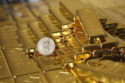 Фьючерсы на золото подорожали в ходе американских торгов - smartmoney.one - Reuters