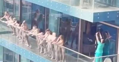 В Дубае более 10 девушек устроили обнаженную фотосессию на балконе и возмутили Сеть: им грозит полгода тюрьмы - tsn.ua - Дубаи