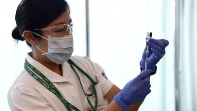 Есихидэ Суг - Японии выделит $700 млн на вакцины от COVID-19 для развивающихся стран - iz.ru - Япония