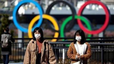 Есихидэ Суг - Японские депутаты потребовали отменить Олимпиаду - vesti.ru - Токио - Япония