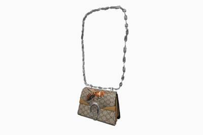 Виртуальная сумка Gucci оказалась дороже реальной - lenta.ru - Twitter