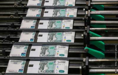 Рубль утром слегка укрепляется к доллару и слабеет к евро - interfax.ru - Москва - США