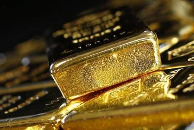 Фьючерсы на золото подорожали в ходе американских торгов - smartmoney.one - Reuters