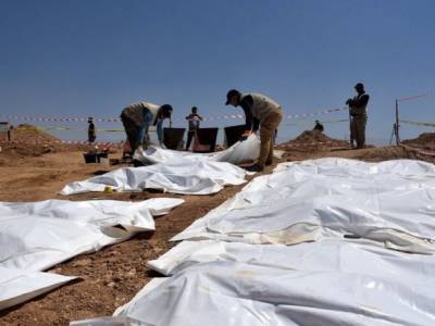 Резня при захвате тюрьмы "Бадуш": Ирак эксгумировал тела из братской могилы - unn.com.ua - Киев - Ирак - Мосул