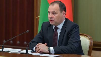 Роман Головченко - Премьер Белоруссии пообещал ответ на санкции стран Запада - russian.rt.com - Англия - Канада - Брюссель