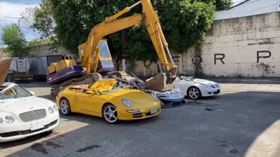 Porsche - На Филиппинах таможенники уничтожили контрабандные автомобили премиум-класса на $ 58 млн. - ukrpost.biz - Филиппины