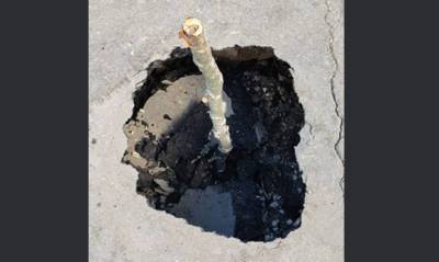 В Ухте из-под асфальта рядом с жилым домом вышла нефтесодержащая жидкость - og.ru - респ. Коми - Экология