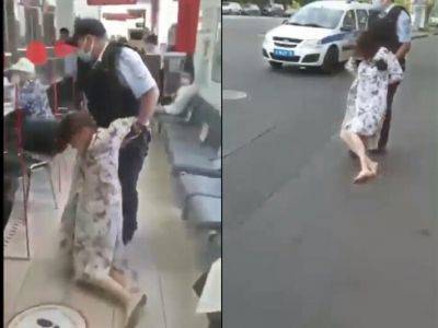На женщину, которую выволокли из МФЦ после отказа надеть маску, завели уголовное дело - kasparov.ru - Москва - Россия