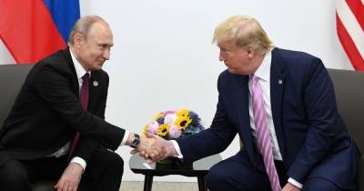 Дональд Трамп - Владимир Путин - Путин поддержал "неуравновешенного" Трампа на выборах для ослабления США, - The Guardian - focus.ua - Россия - США - Украина - Англия